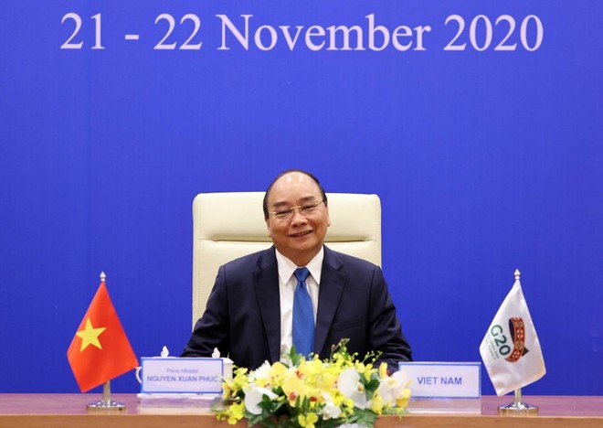 Thủ tướng Nguyễn Xuân Phúc đề nghị G20 xây dựng thỏa thuận sản xuất vaccine Covid-19 trên toàn cầu ảnh 1