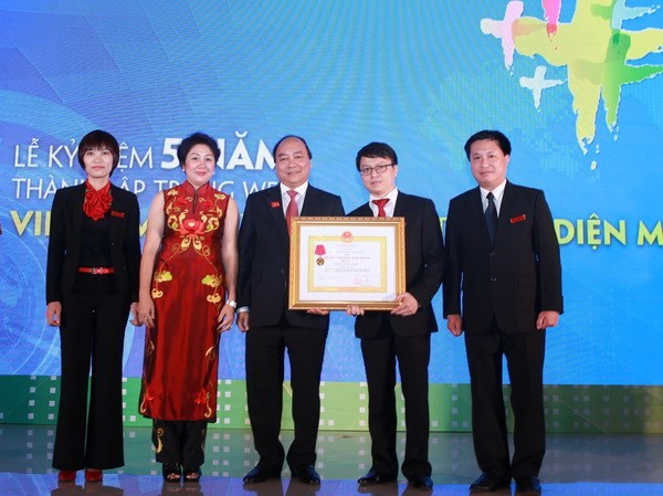 Báo điện tử Vietnam+ đón Huân chương Lao động hạng Ba ảnh 1