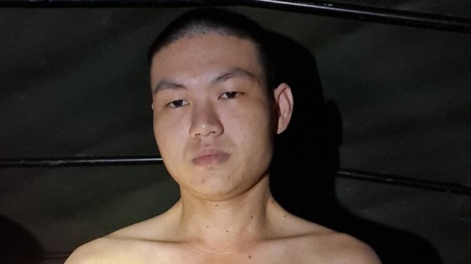 Đối tượng Quốc thời điểm bị bắt giữ (Ảnh: Công an nhân dân)