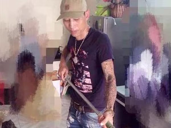 Kẻ trốn truy nã lộ diện bởi hình xăm kín người ảnh 1