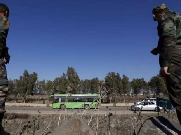 Phiến quân ở Homs đầu hàng quân đội Syria ảnh 1