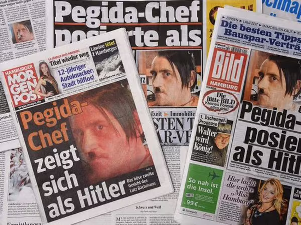 Lãnh đạo Pegida từ chức vì miệt thị người tỵ nạn và cải trang thành Hitler ảnh 1