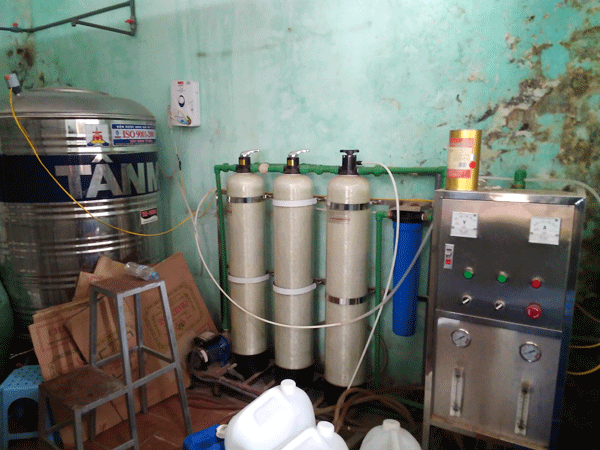 Hà Nội: Phát hiện lò sản xuất hàng vạn chai rượu giá rẻ ảnh 2 Hà Nội: Phát hiện lò sản xuất hàng vạn chai rượu giá rẻ ảnh 2