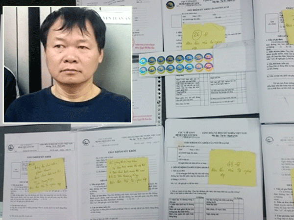 Bóc gỡ đường dây cung cấp giấy tờ giả ảnh 1