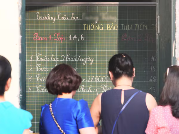 Thu tiền trường đầu năm học: Vẫn thu gộp, thu quá các khoản tự nguyện ảnh 1 Thu tiền trường đầu năm học: Vẫn thu gộp, thu quá các khoản tự nguyện ảnh 1