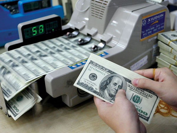 Xử nghiêm ngân hàng "vượt rào" huy động USD ảnh 1 Xử nghiêm ngân hàng "vượt rào" huy động USD ảnh 1