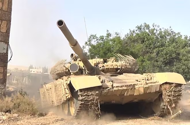 Bị phiến quân tấn công, xe tăng T-72 của quân đội Syria đâm xuống sông ảnh 1 Bị phiến quân tấn công, xe tăng T-72 của quân đội Syria đâm xuống sông ảnh 1