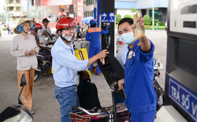 Xăng tăng giá gần 600 đồng/lít ảnh 1 Xăng tăng giá gần 600 đồng/lít ảnh 1