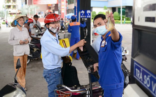Xăng tăng giá gần 600 đồng/lít ảnh 1 Xăng tăng giá gần 600 đồng/lít ảnh 1