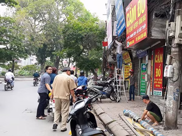 Việc tháo dỡ mái che di động trên đường Láng là cần thiết, đúng quy trình ảnh 1 Việc tháo dỡ mái che di động trên đường Láng là cần thiết, đúng quy trình ảnh 1