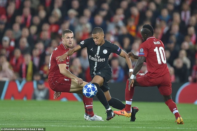 French starlet Mbappe tries to launch an attack as he glides past the challenges of Sadio Mane and Jordan Henderson