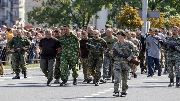 Donetsk trao trả hàng trăm tù binh Ukraine bất chấp lệnh ngừng bắn bị thách thức ảnh 1 Donetsk trao trả hàng trăm tù binh Ukraine bất chấp lệnh ngừng bắn bị thách thức ảnh 1