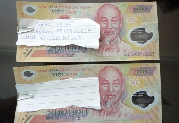 Phát hiện gần 30 triệu đồng tiền giả ảnh 2 Phát hiện gần 30 triệu đồng tiền giả ảnh 2