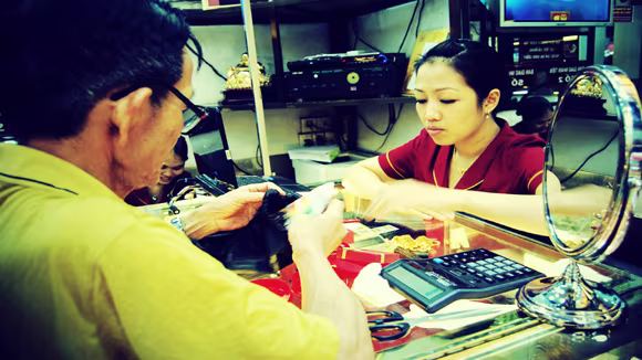 Nhu cầu nắm giữ vàng miếng tạm sụt giảm