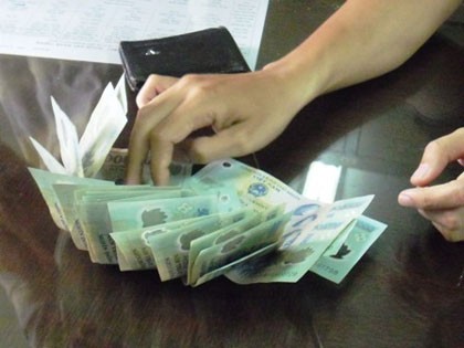 Phó phòng Ngoại vụ bị bắt quả tang khi đang nhận tiền hối lộ ảnh 1 Phó phòng Ngoại vụ bị bắt quả tang khi đang nhận tiền hối lộ ảnh 1