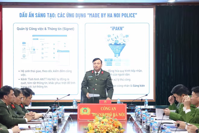 Đại tá Nguyễn Tiến Đạt – Phó Giám đốc CATP Hà Nội tham luận về chủ đề “Chuyển đổi số trong công tác tham mưu đáp ứng yêu cầu, nhiệm vụ trong tình hình mới”