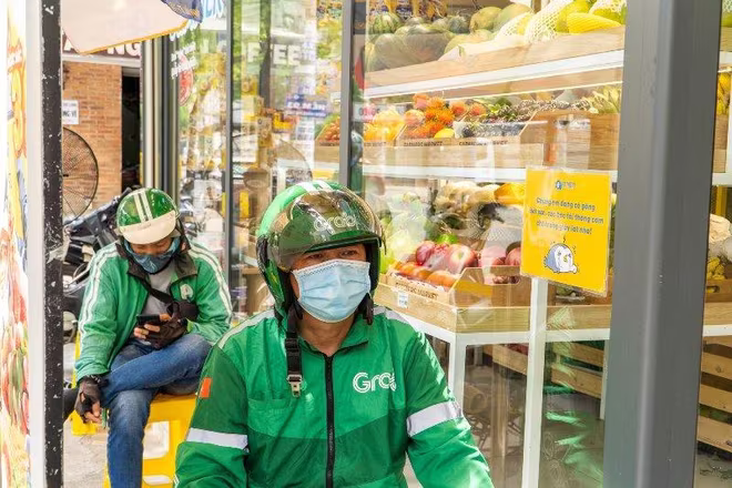 Grab tặng đối tác tài xế gói bảo hiểm PTI- Vững Tâm trong dịch Covid-19 Grab tặng đối tác tài xế gói bảo hiểm PTI- Vững Tâm trong dịch Covid-19