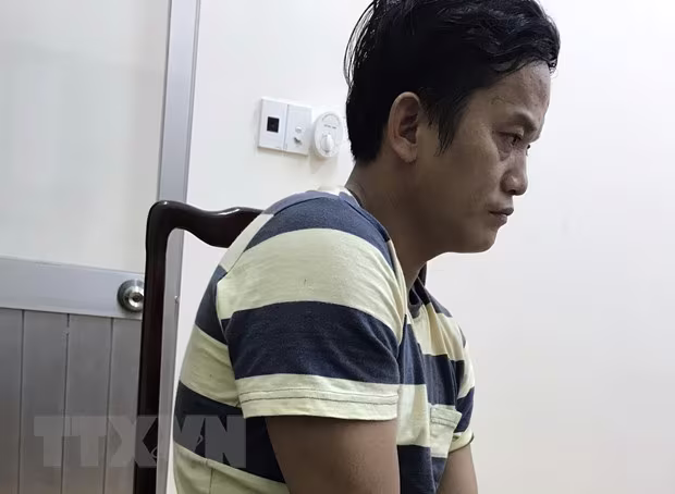 Tài xế Nguyễn Đắc An tại cơ quan công an. Ảnh: TTXVN Tài xế Nguyễn Đắc An tại cơ quan công an. Ảnh: TTXVN