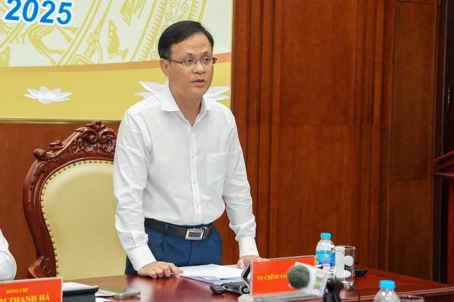 Vụ trưởng Vụ Chính sách tiền tệ Phạm Chí Quang thông tin tại hội nghị